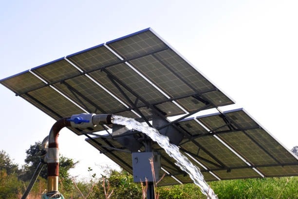 Solar panels powering an agricultural borehole pump system